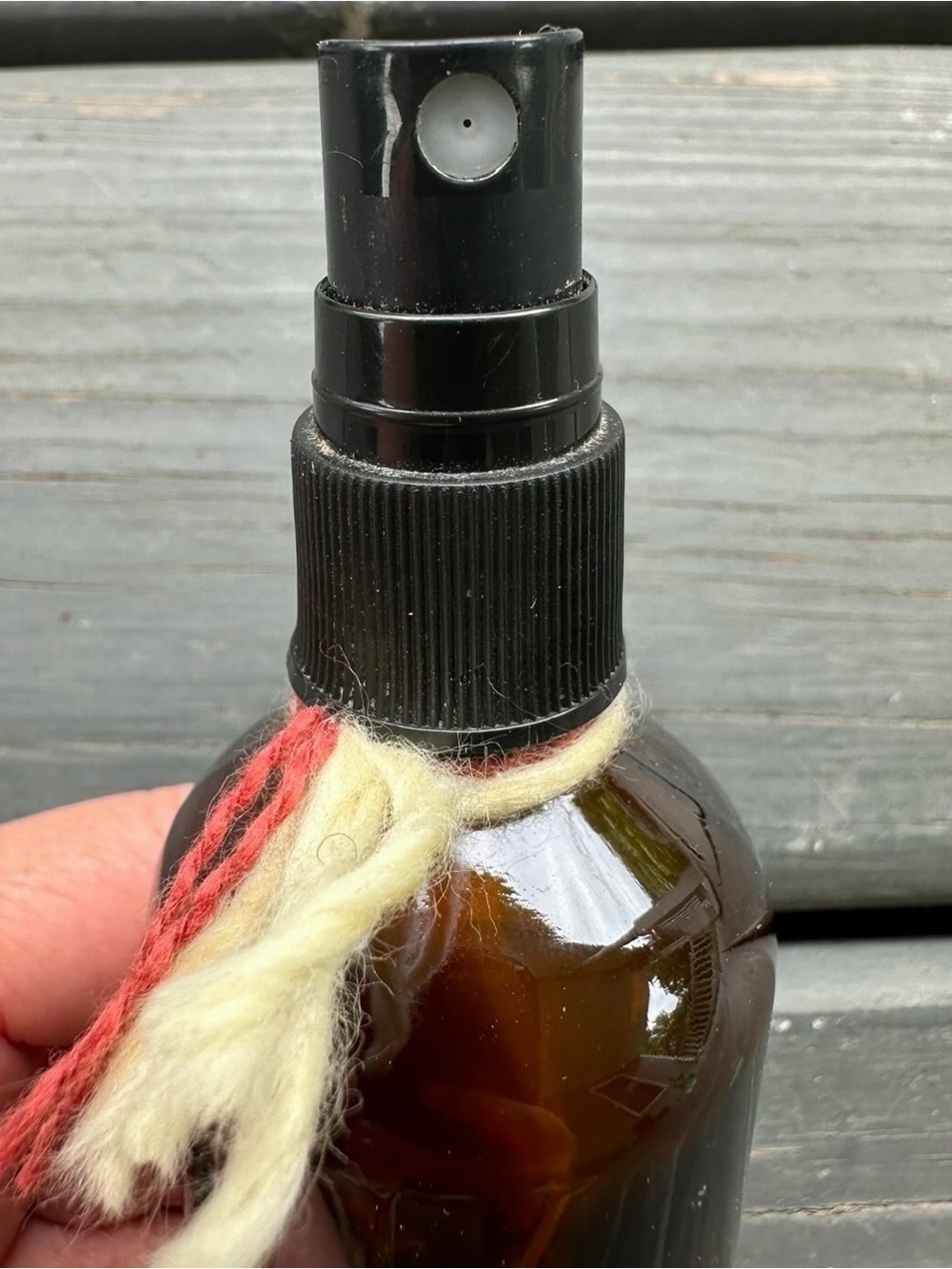 Brown Glass Spray Bottle with Decorative Colored Yarn for Accent- like new